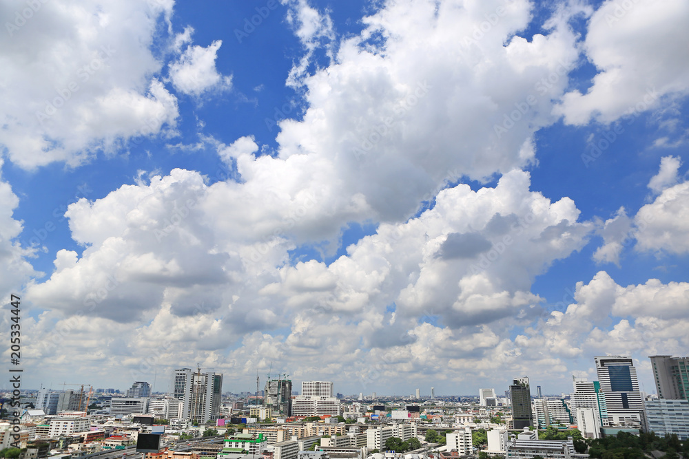 Blue sky with white cloud over City downtown at bangkok, Thailand.