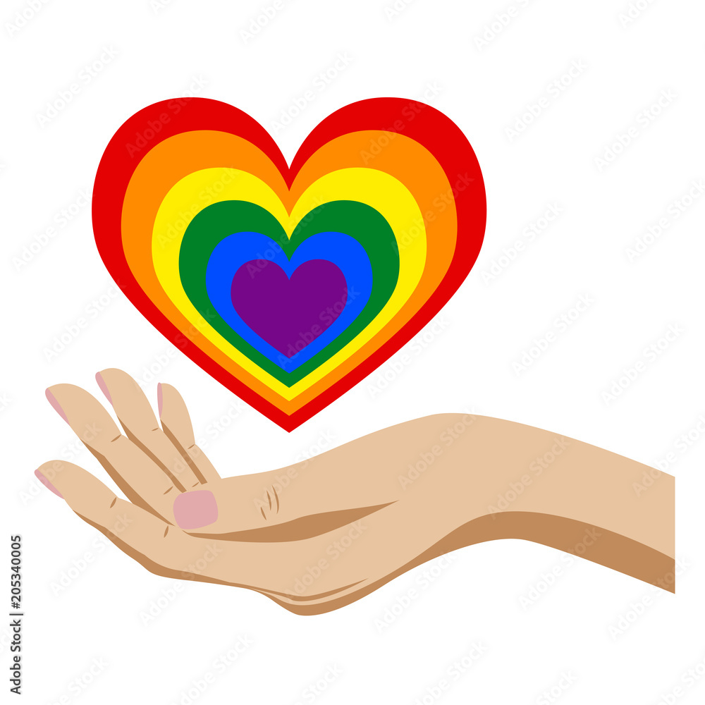 A hand holds a romantic heart in the color of an LGBT on a white background A hand holds a romantic heart in the color of an LGBT on a white background