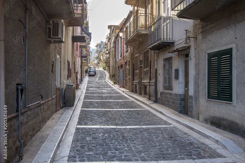 Narrow street of Lascari in Sicily, Italy Narrow street of Lascari in Sicily, Italy