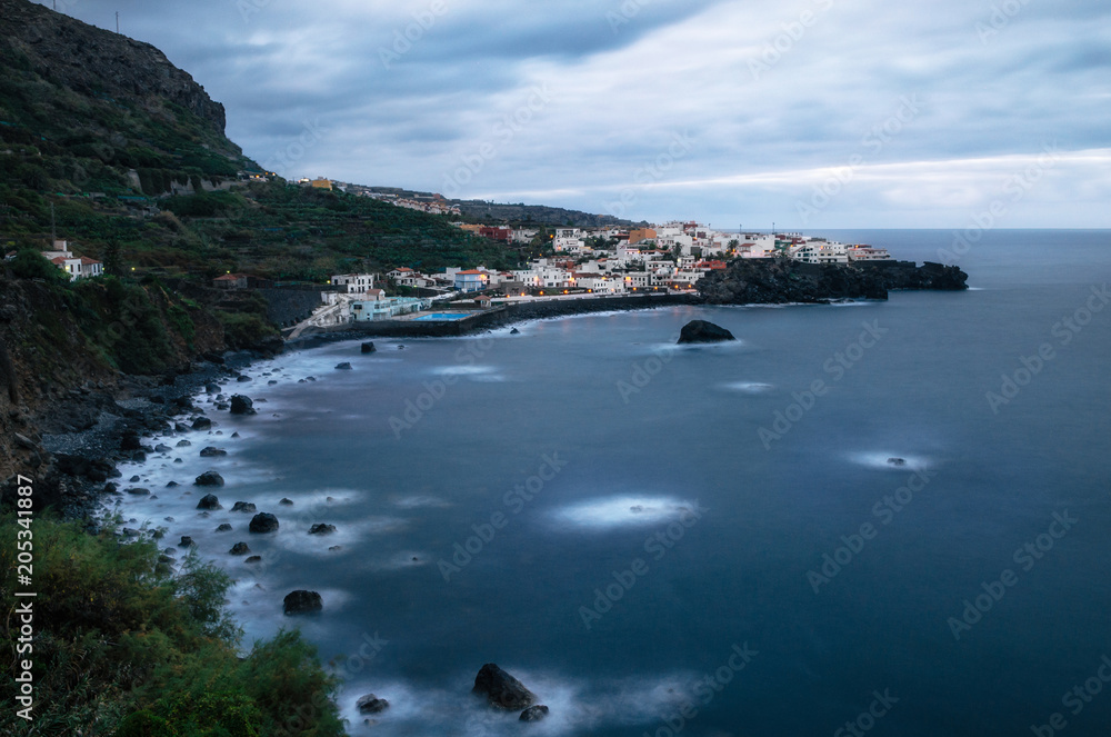 View towards Los Aguas village in dusk with illumination, Tenerife Island, Canary Islands, Spain