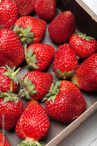 Beautiful strawberry background, delicious fruit in box.