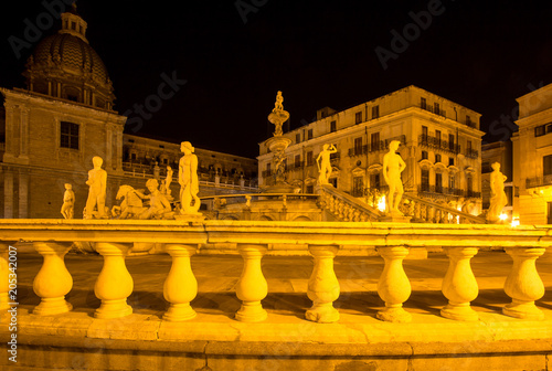 Fountain of shame on  Piazza Pretoria at night, Palermo, Italy