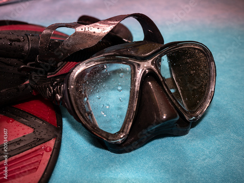 Close-up of snorkeling equipment. Diving goggles and fins.