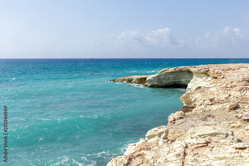 View of a rocky coast in the morning View of a rocky coast in the morning