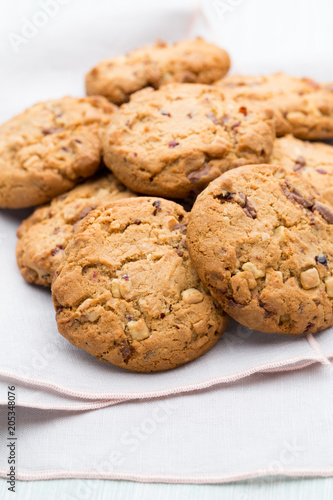 Chocolate oatmeal cookies on the  wooden background.