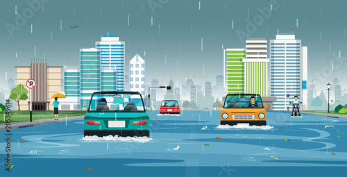 Cars are running on flooded streets in the city.
