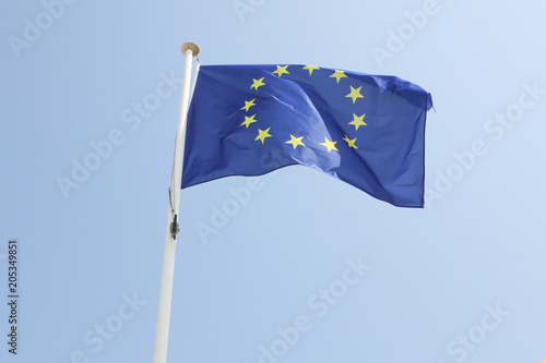 Europe flag on a mat in the wind and blue sky
