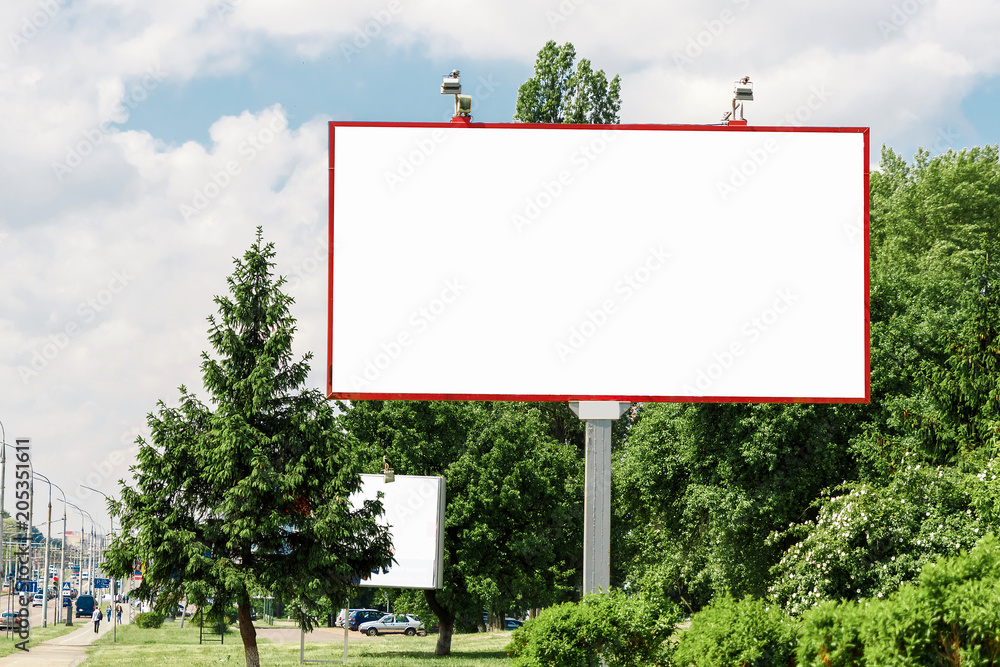 Billboard, billboard, canvas billboard, layout on the background of the city. The concept of outdoor advertising, marketing, sales. mockup Billboard, billboard, canvas billboard, layout on the background of the city. The concept of outdoor advertising, marketing, sales. mockup