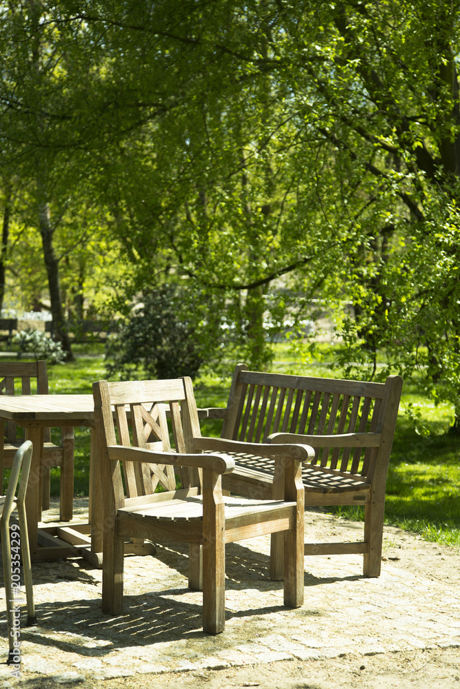 Rustic wooden furniture in the garden Rustic wooden furniture in the garden