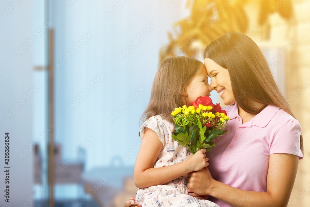 Happy Mother and daughter hugging Happy Mother and daughter hugging