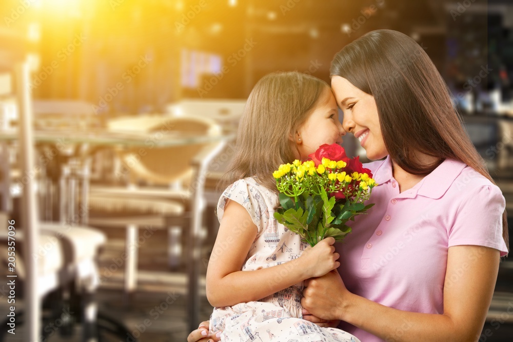 Happy Mother and daughter hugging Happy Mother and daughter hugging