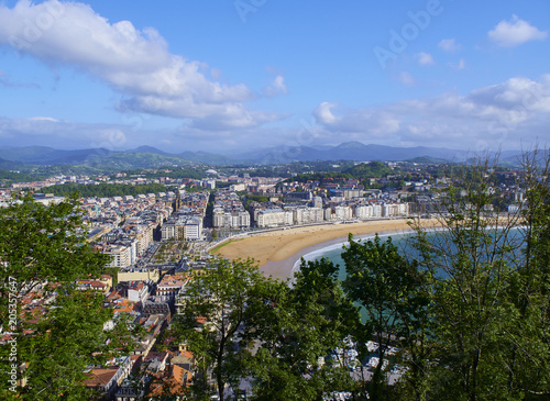 Panoramic view of Concha Bay and Concha Beach from Monte Urgull at sunny day San Sebastian (Donostia), Basque Country, Guipuzcoa. Spain.