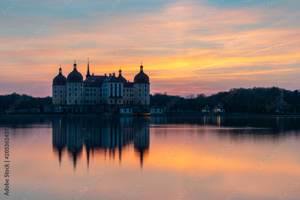 Castle Moritzburg in Saxony near Dresden. Pond reflection. Springtime. Germany.