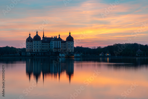 Castle Moritzburg in Saxony near Dresden. Pond reflection. Springtime. Germany. © catuncia