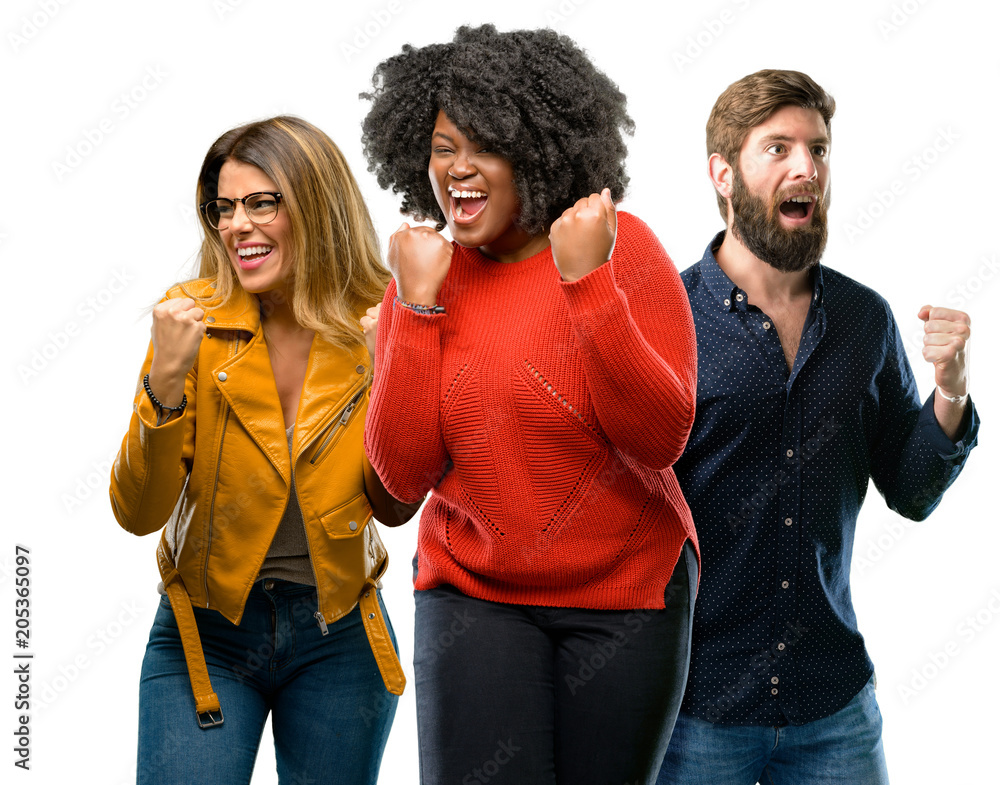 Group of three young men and women happy and excited expressing winning gesture. Successful and celebrating victory, triumphant Group of three young men and women happy and excited expressing winning gesture. Successful and celebrating victory, triumphant