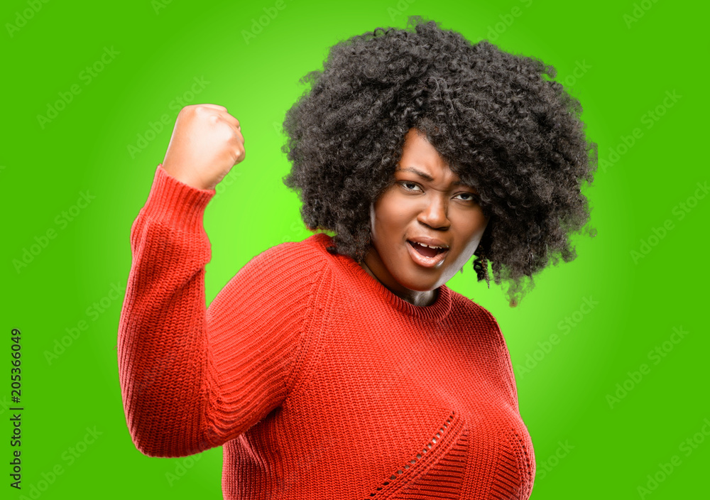 Beautiful african woman irritated and angry expressing negative emotion, annoyed with someone Beautiful african woman irritated and angry expressing negative emotion, annoyed with someone