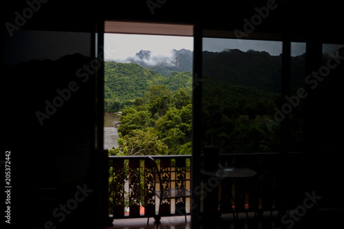 view from the window to the mountains and river