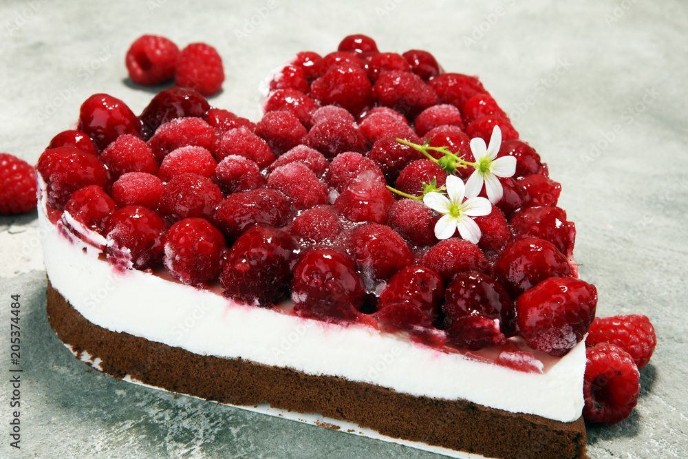 raspberry cake and many fresh raspberries. - obrazy, fototapety, plakaty 