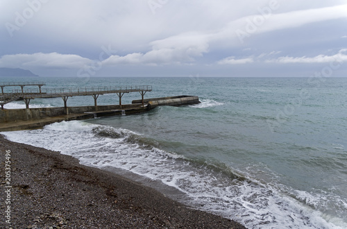 Empty beach in bad rainy weather. Crimea.