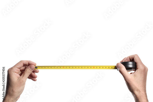 man's hand holding a tape measure on white background with clipping path and copy space