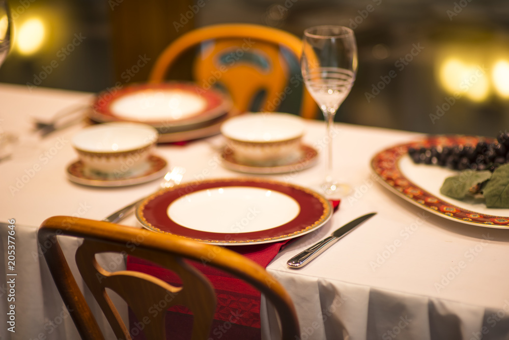 Naklejka premium New Year , Christmas . Table setting for a banquet or dinner party.