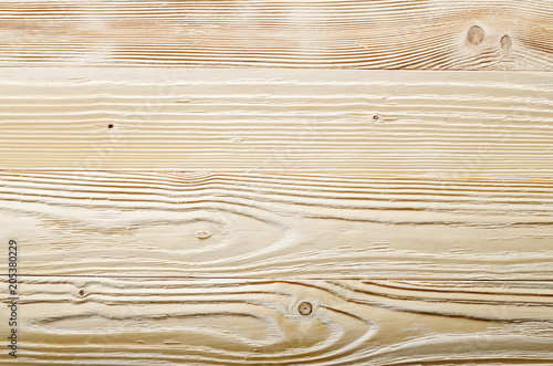 Weathered pine wood planks background with grained surface. Place for text