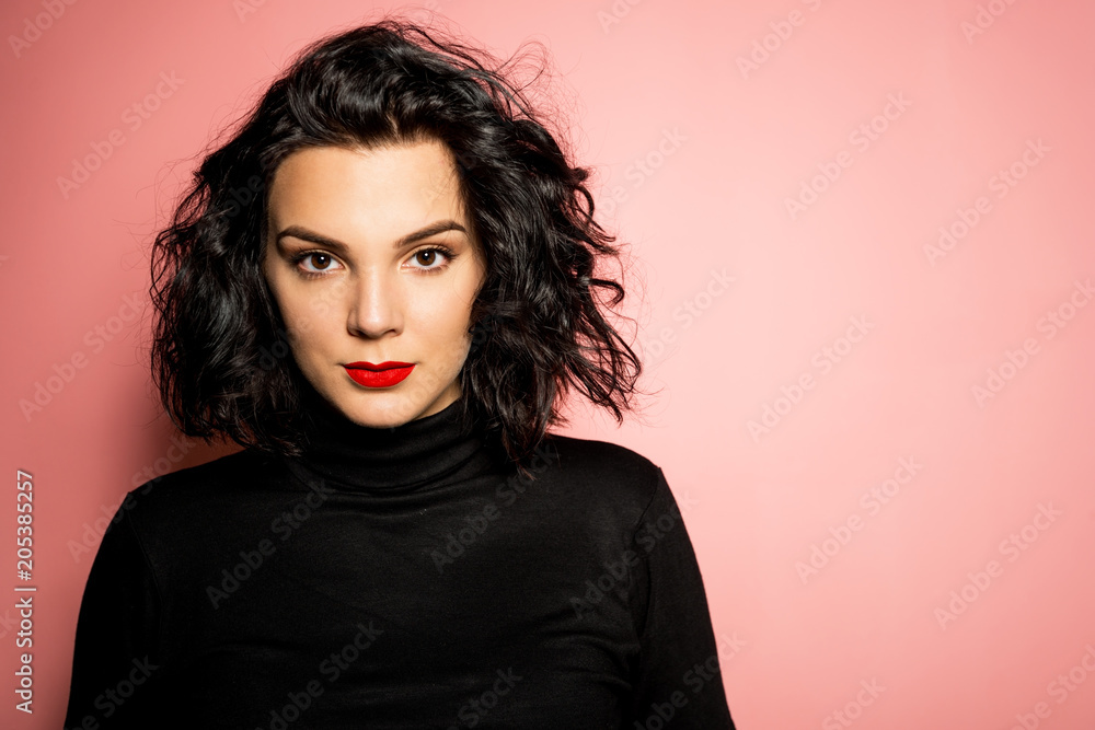 Portrait of young women on pink background Portrait of young women on pink background