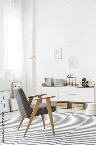 White sideboard in stylish interior