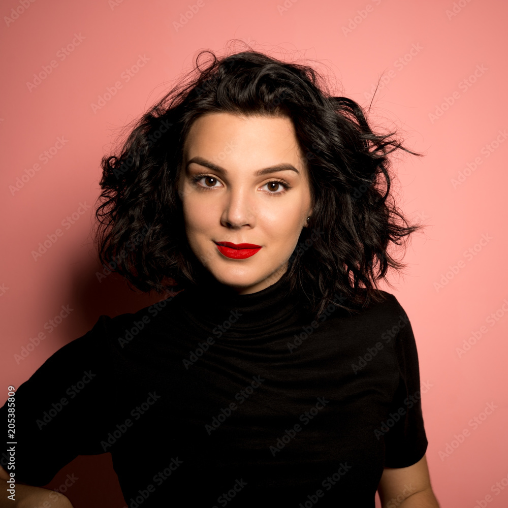 Portrait of young women on pink background Portrait of young women on pink background