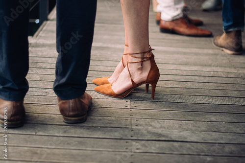 A Couple's footwear at a formal event