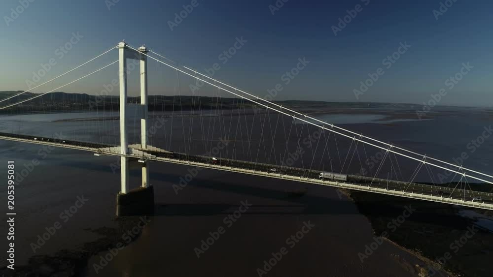 Drone flies slowly backwards from Severn Bridge. Taken on a beautiful spring evening Drone flies slowly backwards from Severn Bridge. Taken on a beautiful spring evening