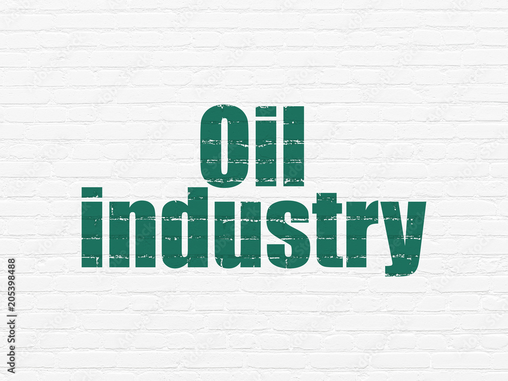 Obraz premium Industry concept: Painted green text Oil Industry on White Brick wall background