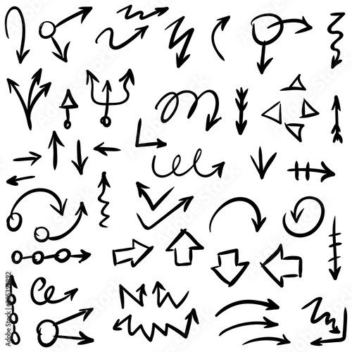 Arrow doodles vector. A set of simple sketches of arrows. Up  down  left  right ones. The effect of a pencil sketch isolated on white background. Vector eps 10.