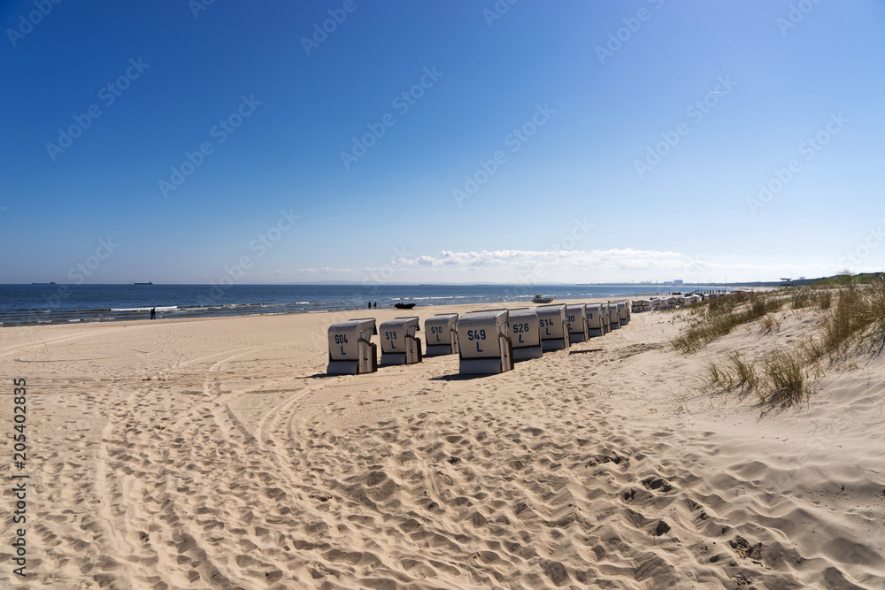 Beach chairs with numbers on a sunny day at the Baltic Sea Beach chairs with numbers on a sunny day at the Baltic Sea