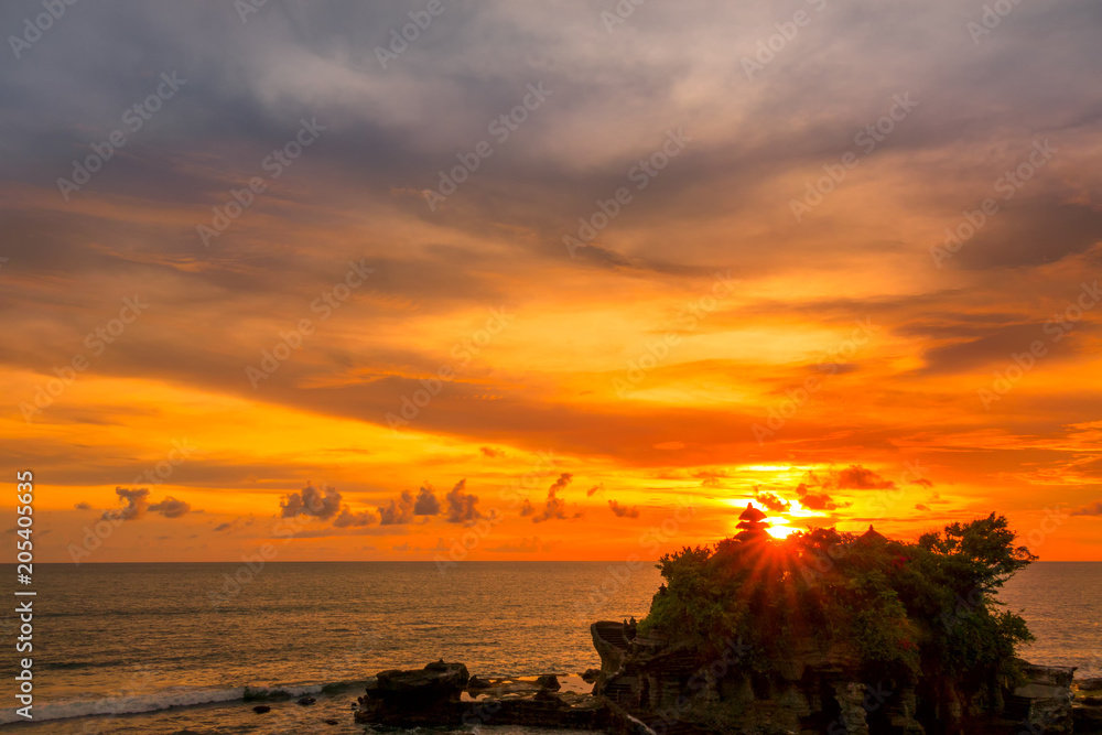 Sunset over the Ocean and Temple on the Island