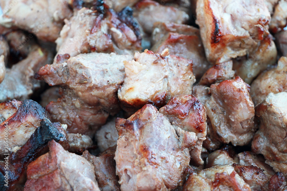 The tasty fried meat on skewers. The tasty fried meat on skewers.