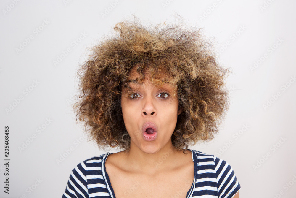 young black woman with surprised expression and mouth open young black woman with surprised expression and mouth open