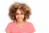 smiling young african american woman with curly hair against white background