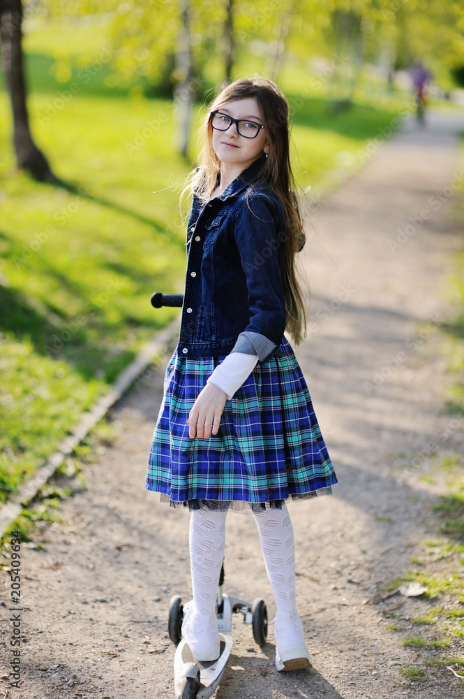 Kid girl in spring park Kid girl in spring park