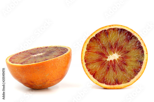 Slice of blood orange isolated on white background photo