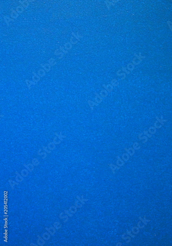 Textura de parede pintada de tinta azul sem brilho.