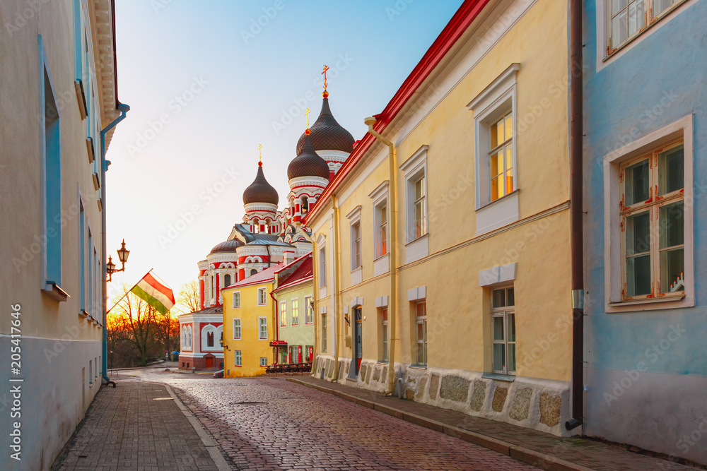 Fototapeta premium Cozy street and Russian Orthodox Alexander Nevsky Cathedral in the morning, Tallinn, Estonia