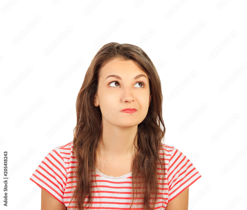 Close-up portrait of a casual pretty young smiling girl thinking about something. emotional girl isolated on white background Close-up portrait of a casual pretty young smiling girl thinking about something. emotional girl isolated on white background
