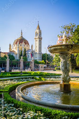 Fountain and mosque in Madrid on a bright sunny day