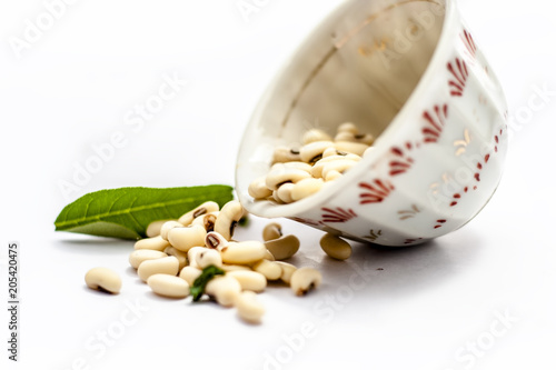 Indian Dal or Lentil called Black eyed peas or Raungi or Lobhia or Choli in a bowl isolated on white. photo