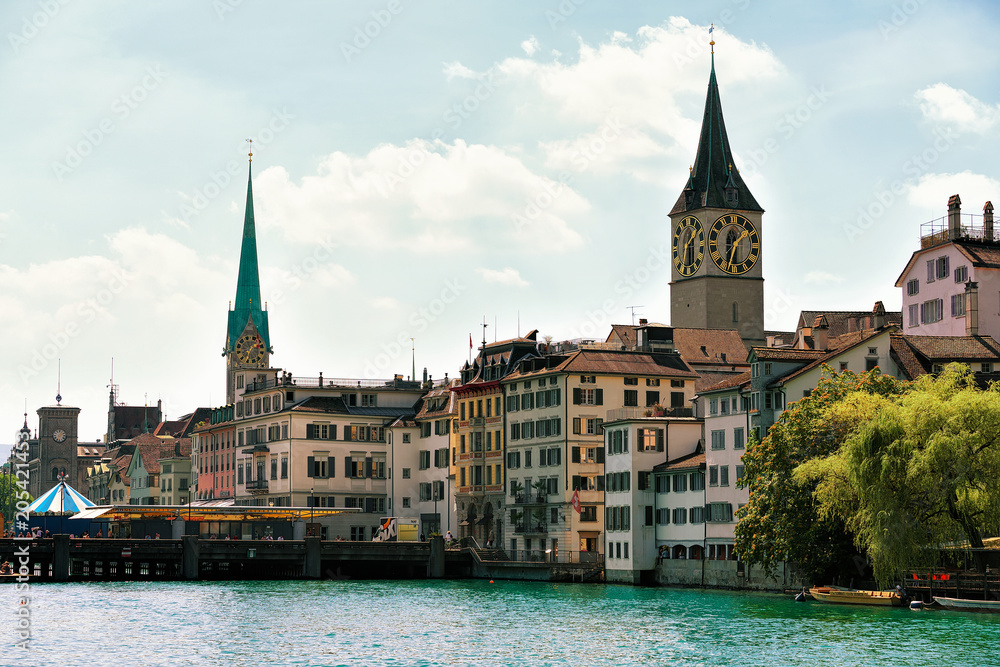 Limmat River quay and Saint Peter Fraumunster Church Zurich