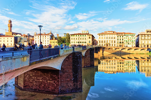 People at Ponte alle Grazie bridge in Florence photo
