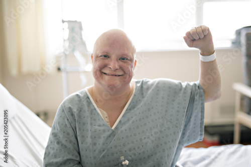 woman in hospital bed suffering from cancer photo