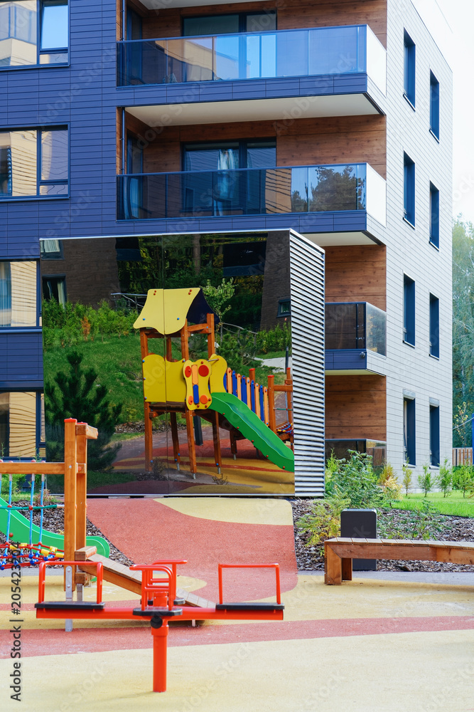Children playground at European modern residential building quarter