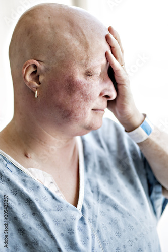 woman in hospital suffering from cancer photo